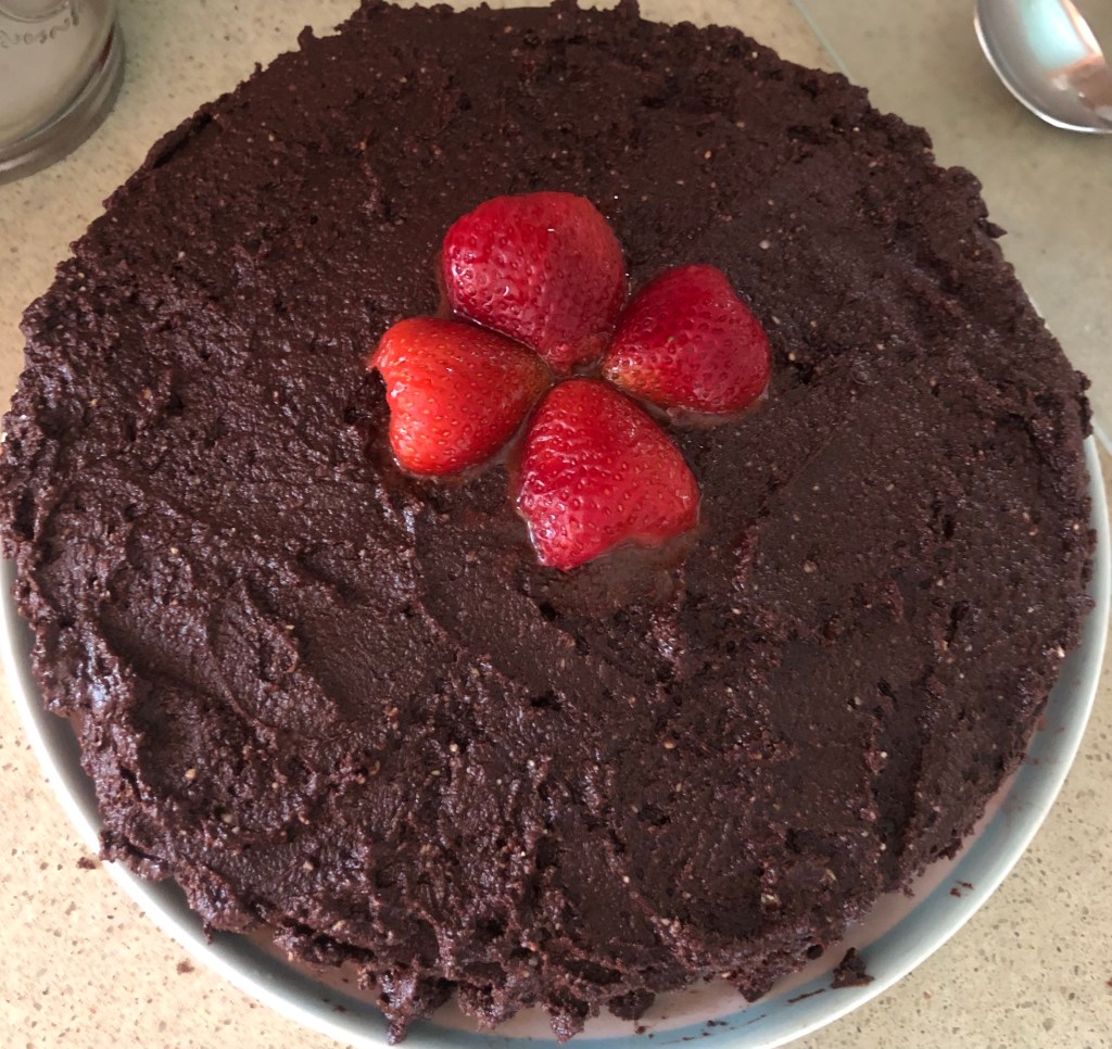 chocolate cake with strawberries on top